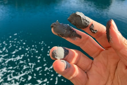 The mud created by erosion under the Kangerlussuup glacier is dark and silky to the touch