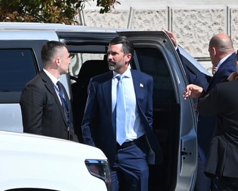 Donald Trump Jr getting out of a car.