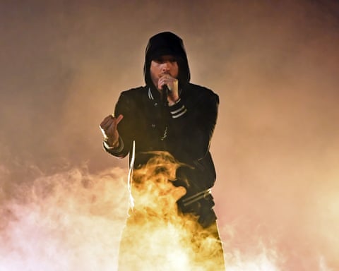 Eminem performing on stage.