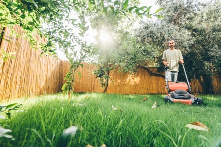 A man mowing his grass