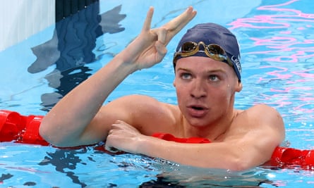 France’s Léon Marchand celebrates after winning gold in the 200m individual medley