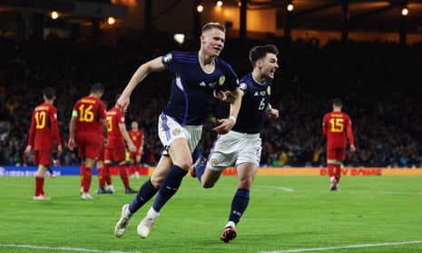 Scott McTominay runs away in delight – with Kieran Tierney at his side – after scoring his and Scotland’s second goal to seal victory over Spain.