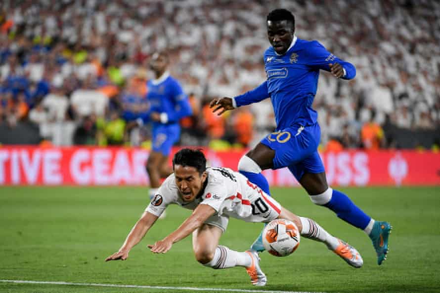 Eintracht Frankfurt v Rangers: Europa League final, extra time – live! | Europa League 5 Frankfurt’s Makoto Hasebe (left) falls as he vies with Rangers’ Fashion Sakala.