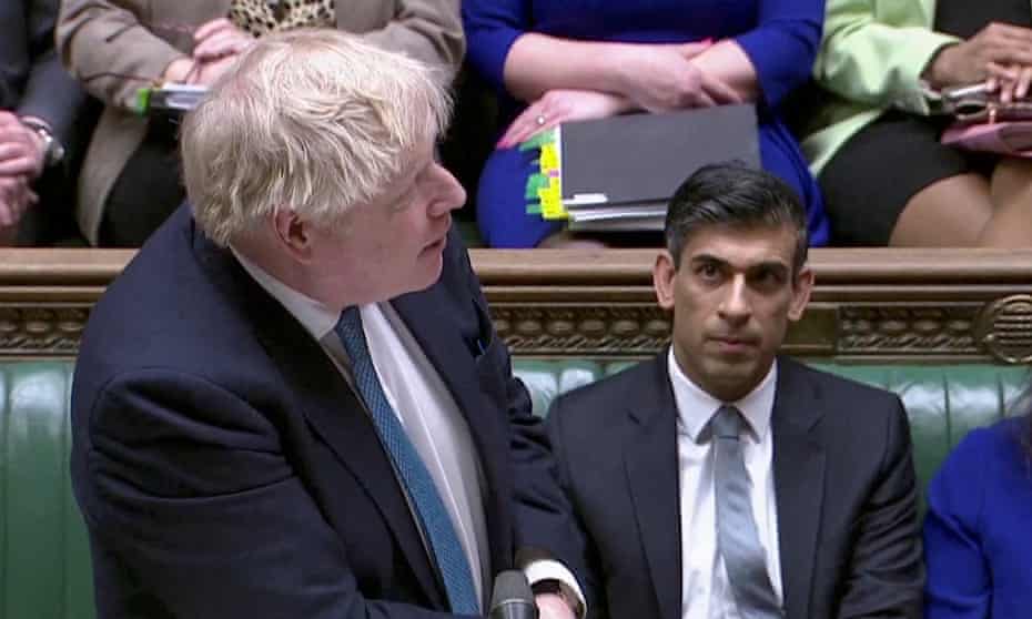 Boris Johnson speaks next to Rishi Sunak during prime minister’s questions in Westminster, 23 March 2022.
