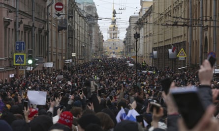Thousands of people attend a protest against the jailing of Alexei Navalny in St Petersburg on 31 January.