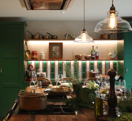A table in a kitchen laid with various Italian goods.