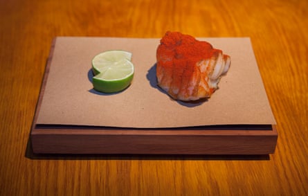 ‘Food comes on wooden boards, on top of brown parchment paper’: the monkfish at Decimo, Kings Cross, London.