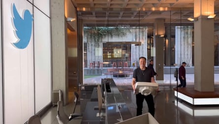 Elon Musk pushes forward with Twitter payments vision Elon Musk enters Twitter HQ holding a sink