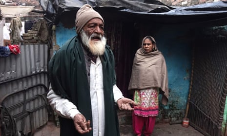 Mohammad Sharif, 74, and his wife, in front of their hut in Kanpur, Uttar Pradesh. The couple’s son, Mohammad Raees, was shot dead by police.