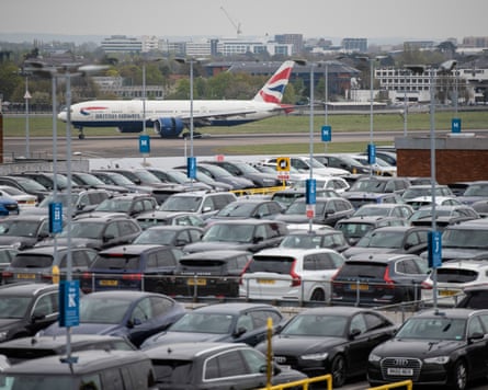 A afloat car parkland astatine Heathrow with a British Airways level successful the distance