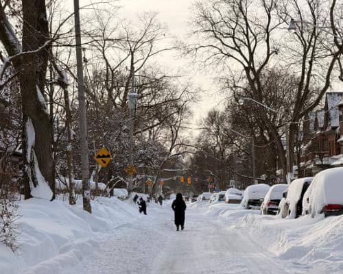 Toronto digs itself out after largest snowfall in city's history | Toronto | The Guardian