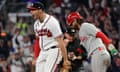 Braves first baseman Matt Olson celebrates after putting out the Phillies’ Bryce Harper in a double play to end Game 2 of the National League Division Series in Truist Park in Atlanta on Monday.