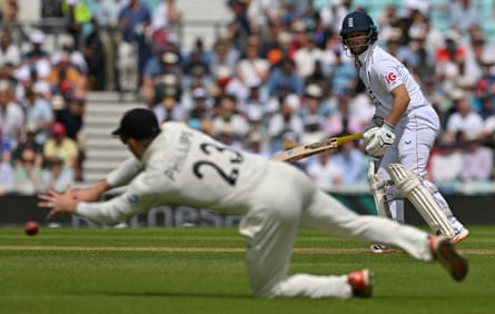 Ben Duckett watches as Glenn Phillips dives but fails to catch him out