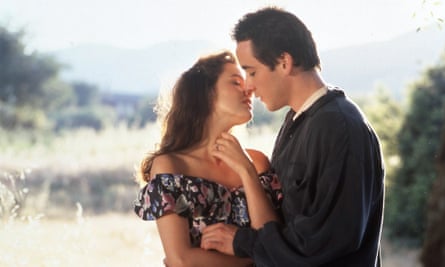 Ione Skye and John Cusask embrace