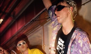 Two guys raving in shades