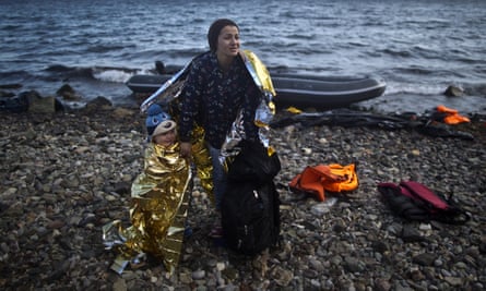 A Syrian woman and child on the Greek coast