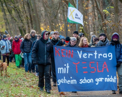 Demonstrators opposing the removal of a permanent protest camp outside the Tesla factory on 12 November.