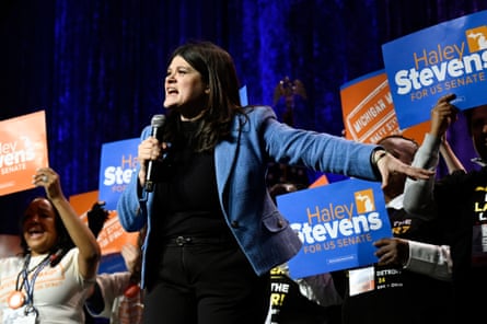 Woman speaks into microphone