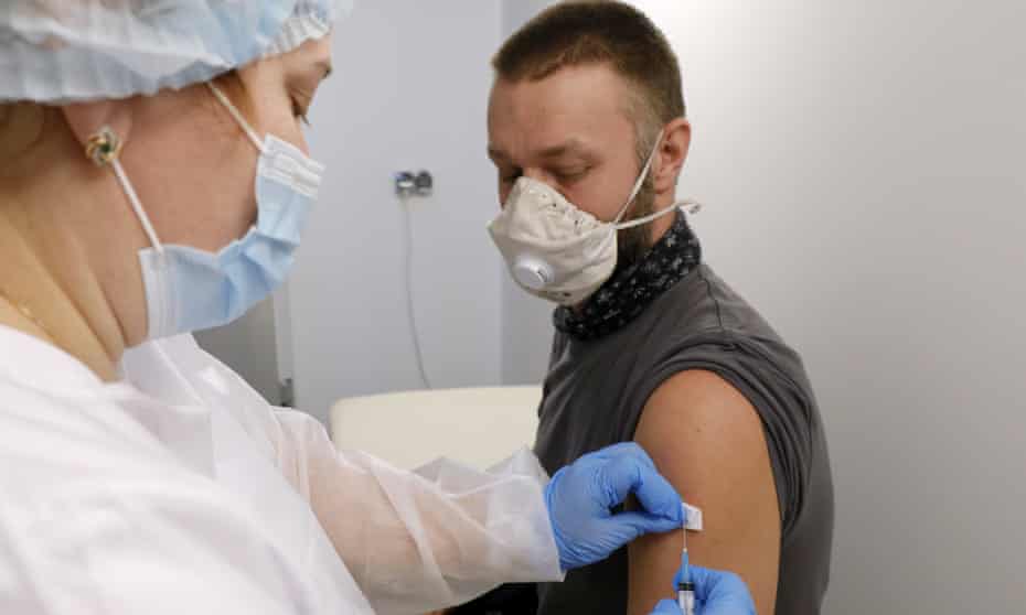 A man receives a Covid vaccine