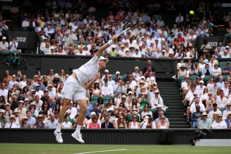 Jannik Sinner send in a serve to Nuno Borges.