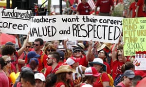 Thousands protest at the Arizona capitol for higher teacher pay and school funding on 26 April.