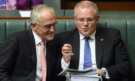 Australian Prime Minister Malcolm Turnbull speaks to Australian Treasurer Scott Morrison during House of Representatives Question Time, 2016
