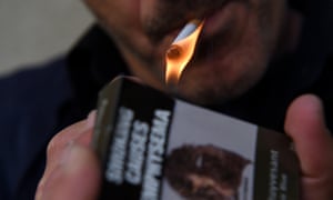 Man lighting a cigarette