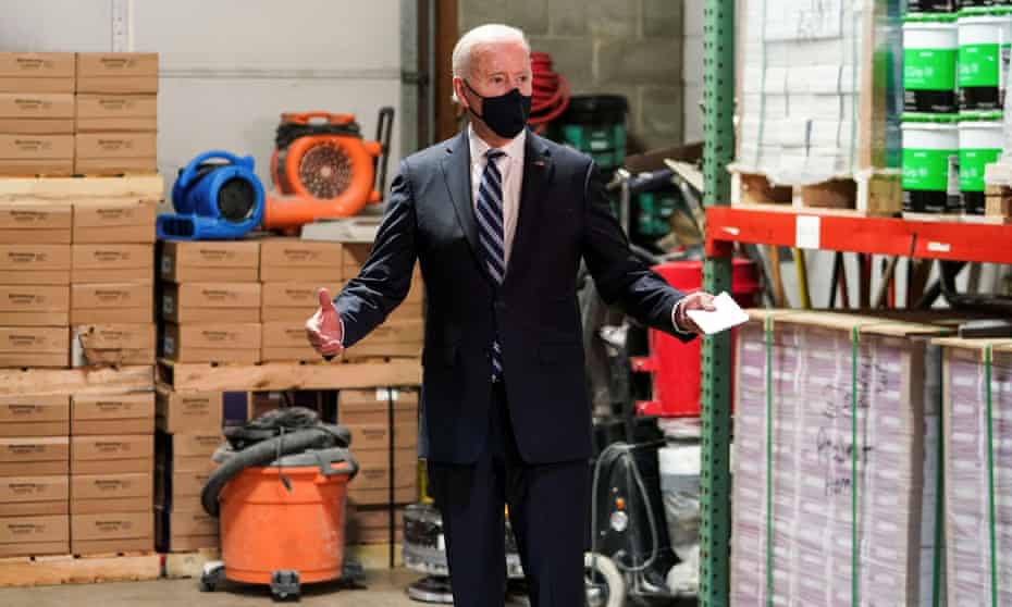 Joe Biden promotes his American Rescue Plan during a visit to a small business in Chester, Pennsylvania in March