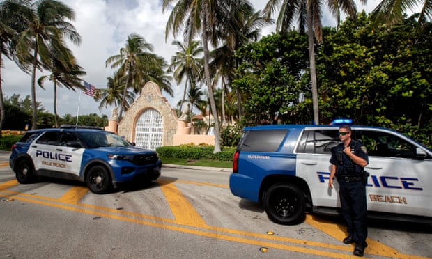 Authorities stand outside Mar-a-Lago on 9 August.