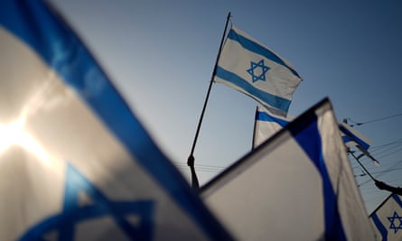 Israeli flags during a protest