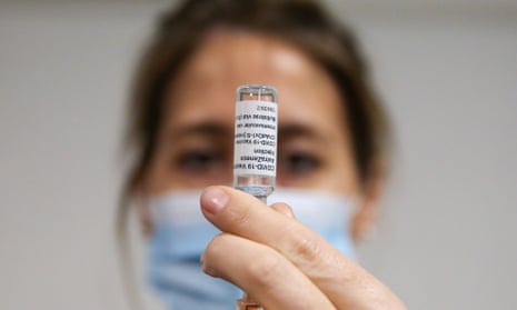 An NHS nurse prepares to administer the Oxford/AstraZeneca Covid vaccine.