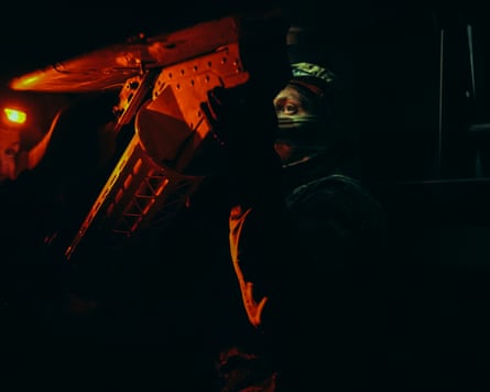 Pilots of the 413 Raid drone regiment preparing an FP-2 for launch