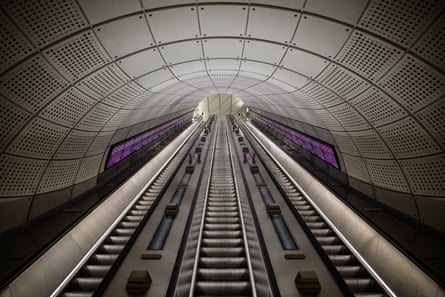 Escalators are seen within an Elizabeth line station