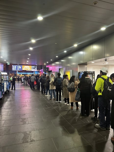 Peak hour commuters queueing at Southern Cross station in Melbourne after delays to V-Line services caused by the Telstra outage. 8 July 2026
