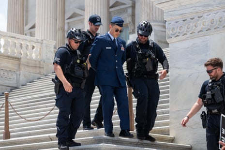 Major Jason Watson of the US air force was arrested by police for demonstrating on the US Capitol steps on Wednesday.