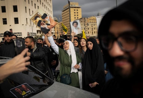 Demonstrators, including Hezbollah supporters, chant slogans during a protest against the direct negotiation between Israel and the Lebanese government, in Beirut.
