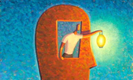 Man holding light from inside a head