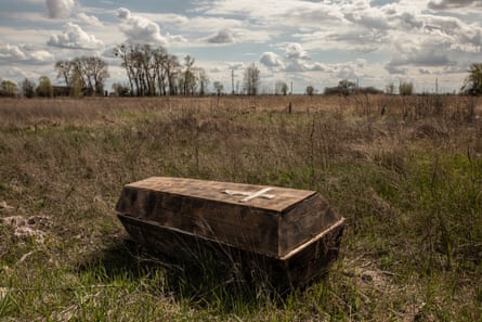 A coffin exhumed from a cemetery near Borodianka, April 2022