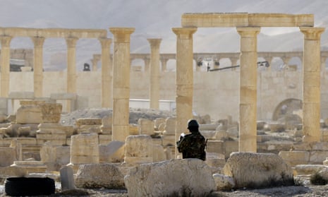 A member of the Syrian army patrols the ancient Syrian city of Palmyra. 