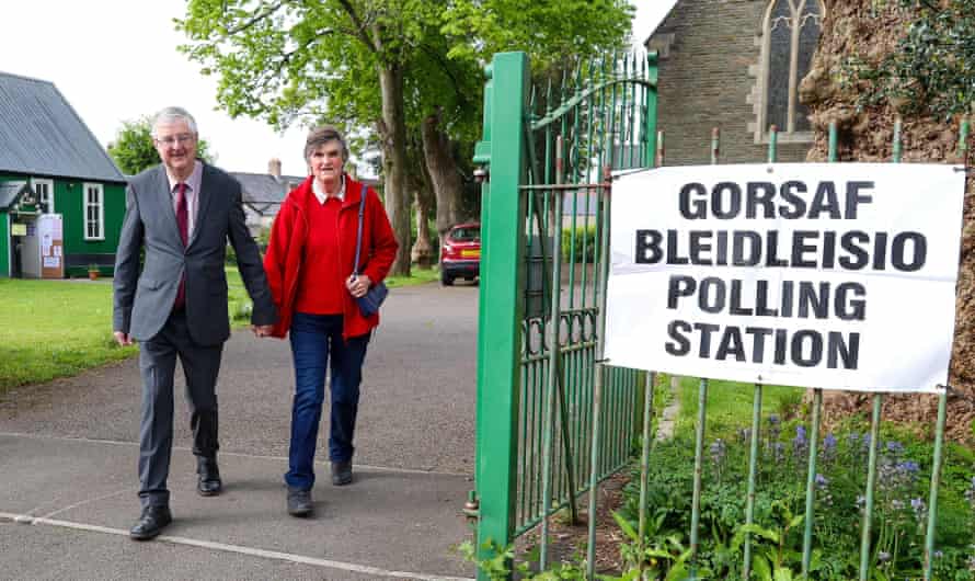 Mark Drakeford, the Welsh first minister, leaving the polling station at St Catherines church hall in Pontcanna, Cardiff, with his wife Clare.