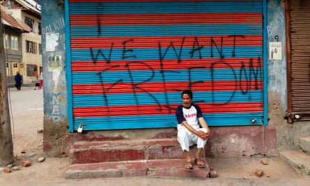Graffiti reads ‘We want freedom’ on a shopfront in Srinagar.