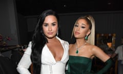 On the move … Demi Lovato, left, and Ariana Grande at the 2020 Grammy awards.