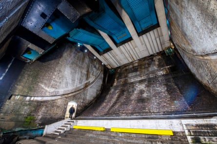 Kindly standing in for scale, technical assistant Eddie, a long standing member of staff, inside one of the bascule chambers of Tower Bridge.