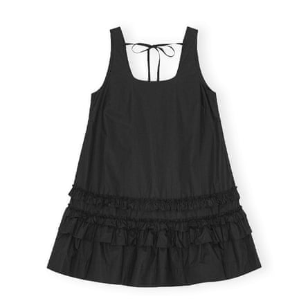 A black poplin mini dress. The dress is sleeveless with a thin ribbon detail to tie in a bow at the back.