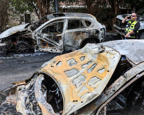 Burnt-out cars in Kiryat Ono, Israel, after an Iranian missile barrage