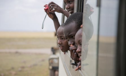Children from Nairobi viewing wildlife in Amboseli National Park, on World Elephant Day, 12 August 2015.