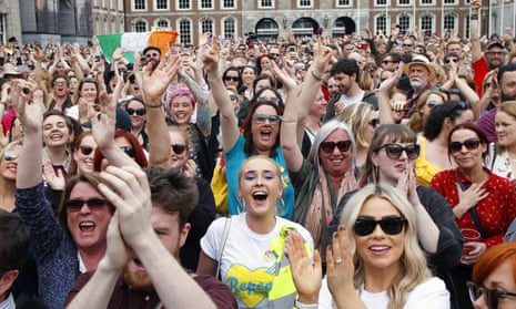 People from the 'Yes' campaign reacted as referendum results indicated voters had overwhelmingly backed repealing the 1983 constitutional ban on abortions.