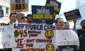 Supporters of the AB5 bill rally at the Capitol in Sacramento, California.