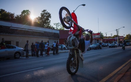 Chino – the most successful urban dirt biker in the world – pulling a vertical wheelie