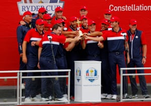 All hands on the trophy.